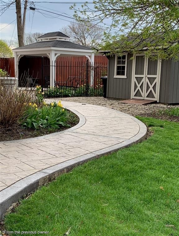 The walk to the gazebo and garden shed