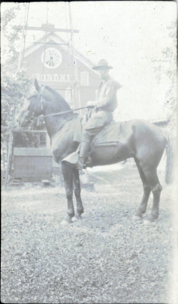 A rider before the barn